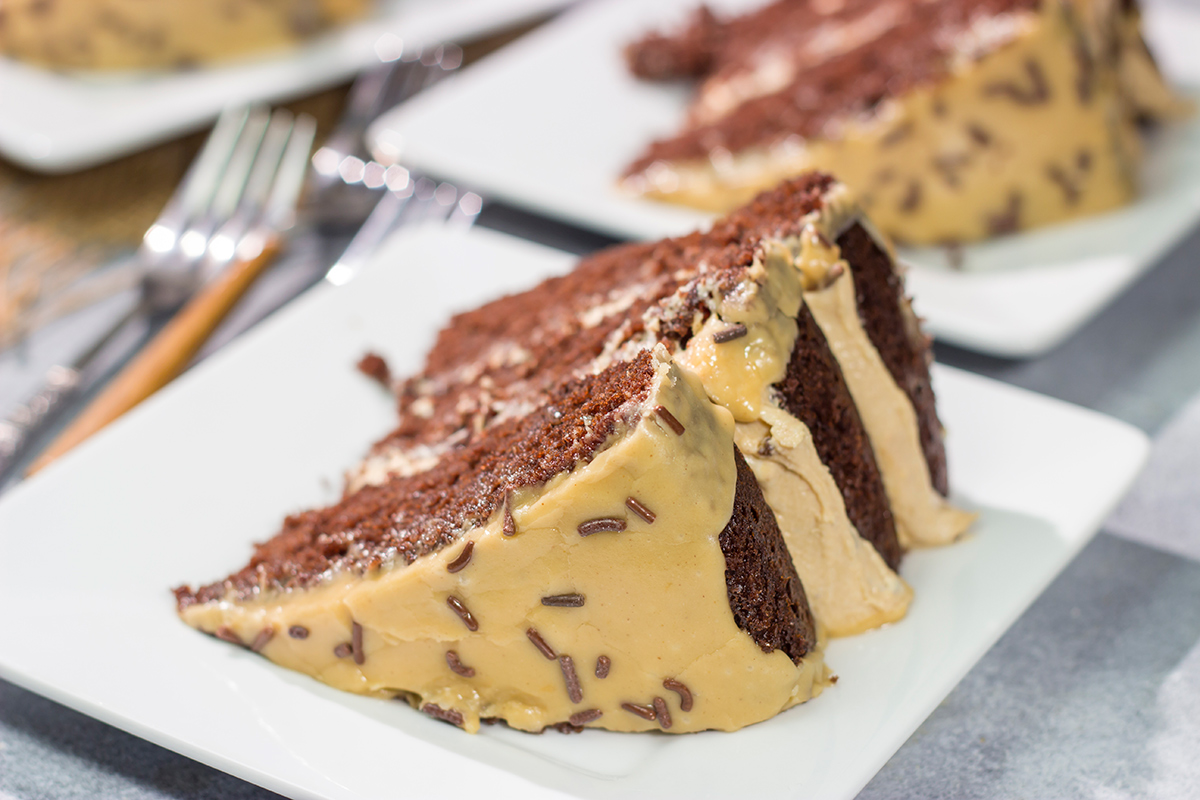 This Chocolate Cake with Peanut Butter Ganache features a chocolate layer cake filled with creamy peanut butter ganache. It's sure to be a new favorite dessert!