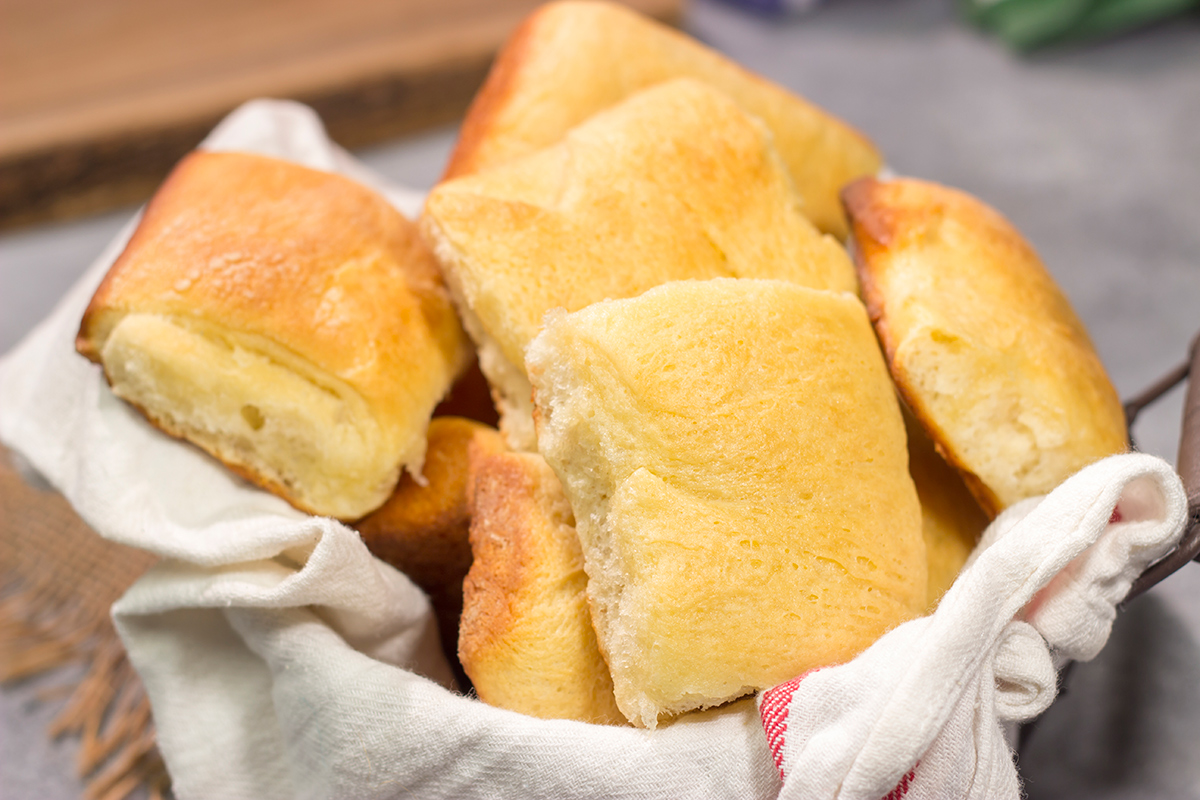 Parker House Rolls are soft, buttery and absolutely delicious! A warm basket of these rolls is perfect for any dinner or holiday gathering.