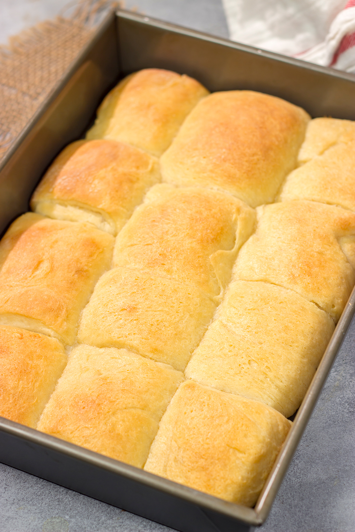 Parker House Rolls are soft, buttery and absolutely delicious! A warm basket of these rolls is perfect for any dinner or holiday gathering.