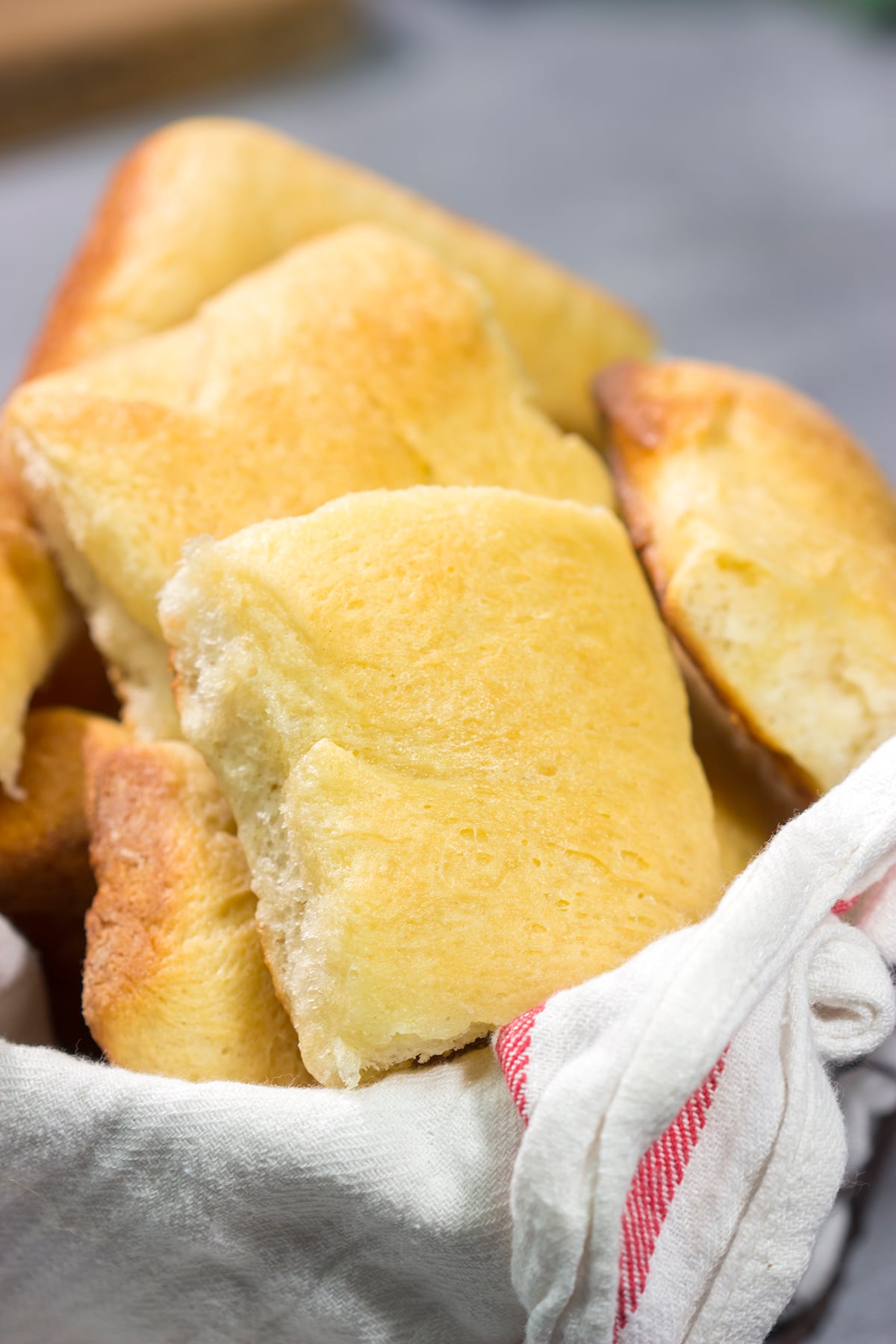 Parker House Rolls are soft, buttery and absolutely delicious! A warm basket of these rolls is perfect for any dinner or holiday gathering.