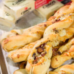 These Cheesy Bacon Breadsticks are proof that bacon and cheese make everything better! These breadsticks are great served as an appetizer or side dish. Enjoy!