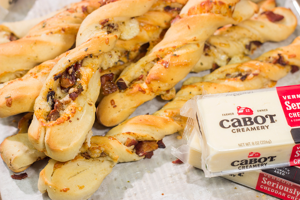 These Cheesy Bacon Breadsticks are proof that bacon and cheese make everything better! These breadsticks are great served as an appetizer or side dish. Enjoy!