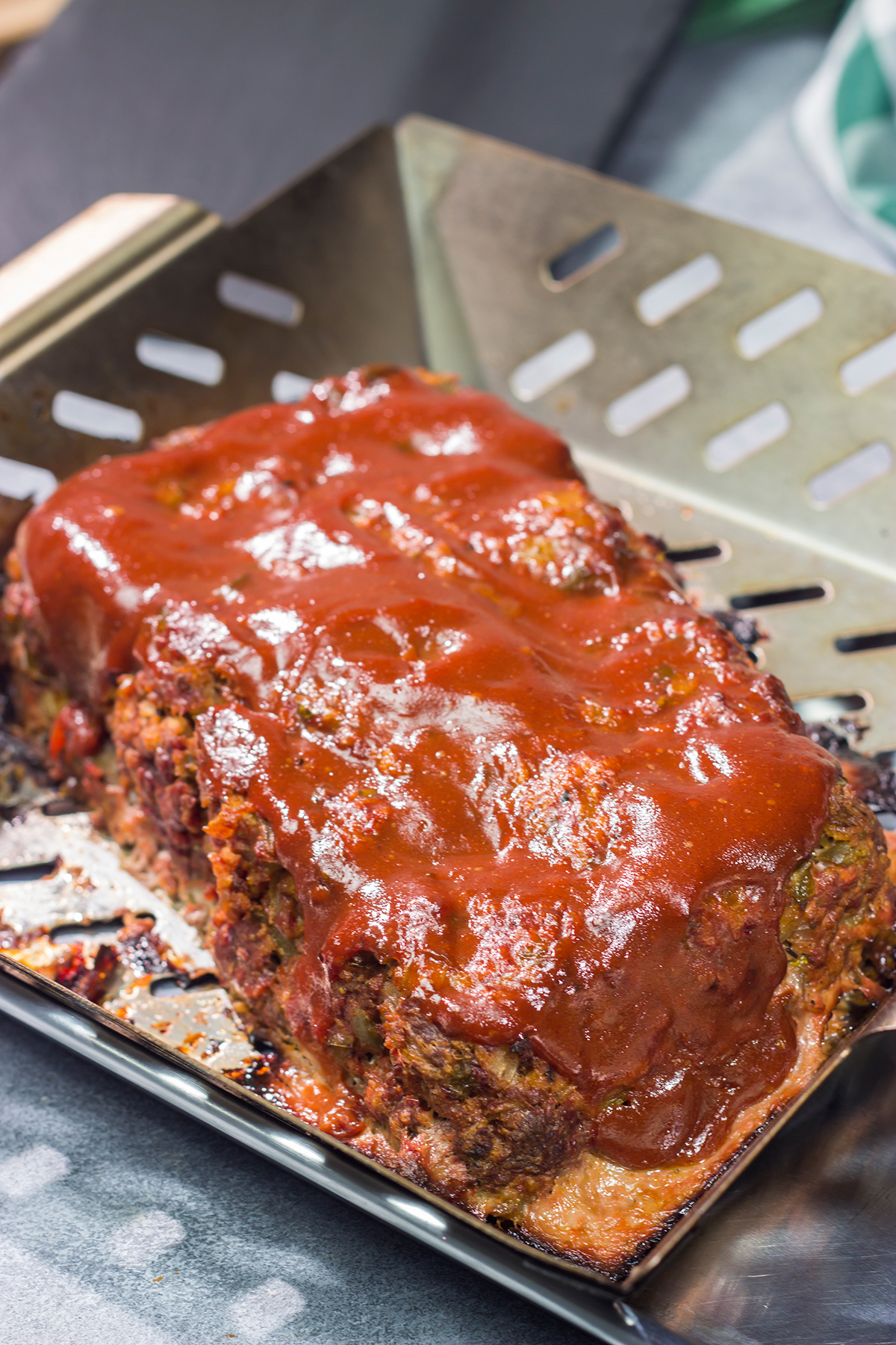 Take a classic comfort food to new levels by adding a mouthwatering smoky flavor. This Smoked Meatloaf recipe will become a household favorite!