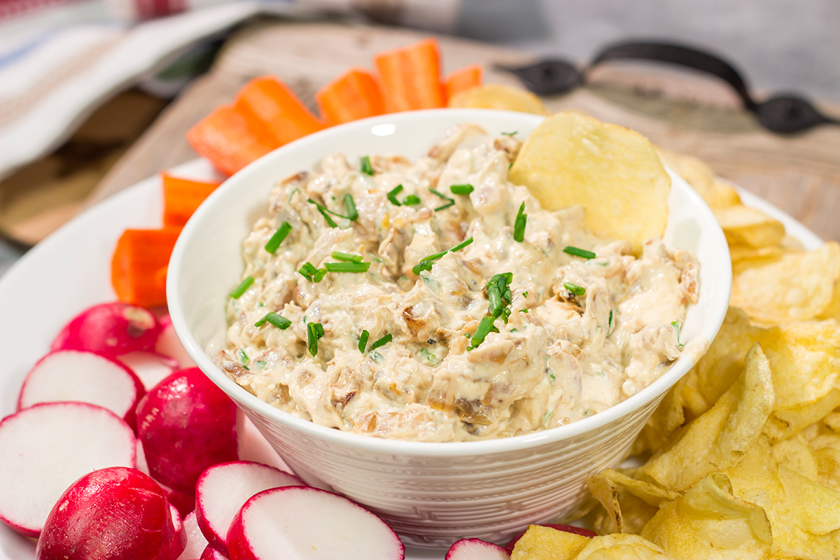 This Caramelized Onion Dip is the perfect party appetizer! Grab some crackers, veggies and chips and get ready to dig into this classic dip!
