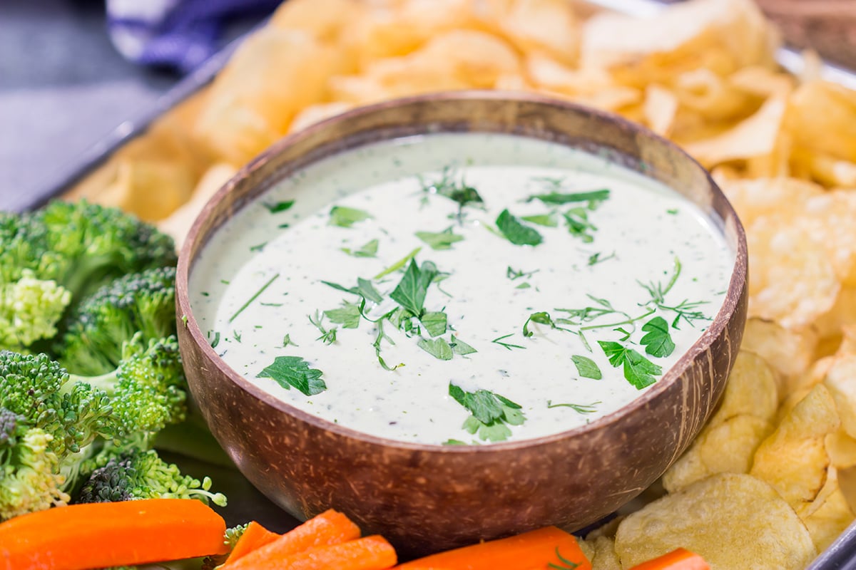 This Goat Cheese Ranch Dip is an easy and delicious party appetizer recipe! It can also be turned into a salad dressing. It's packed with flavor no matter how you serve it!