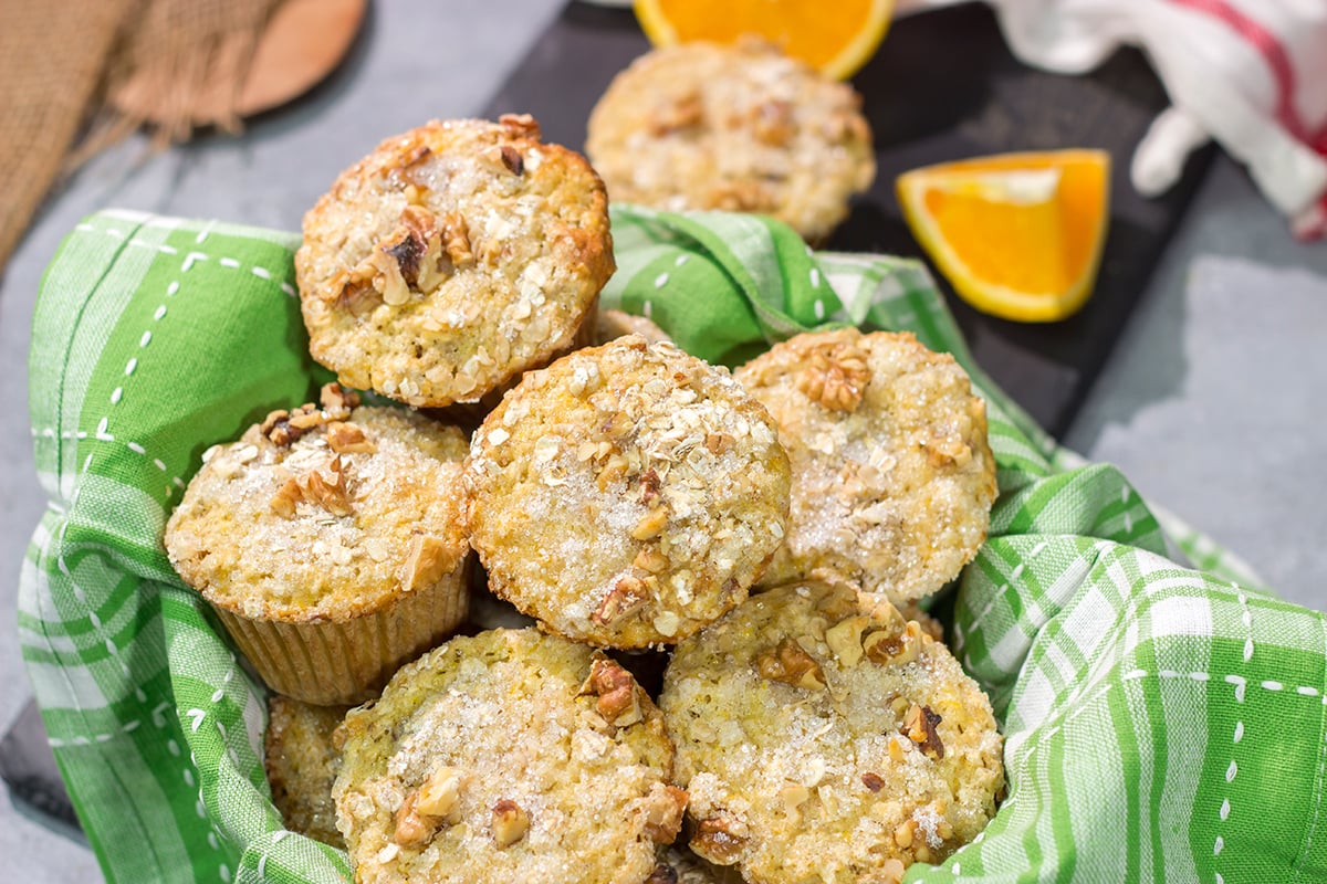 These Orange Walnut Muffins are bursting with citrus flavor. Add in the nutty walnuts, and you've got a fantastic treat for breakfast or brunch!
