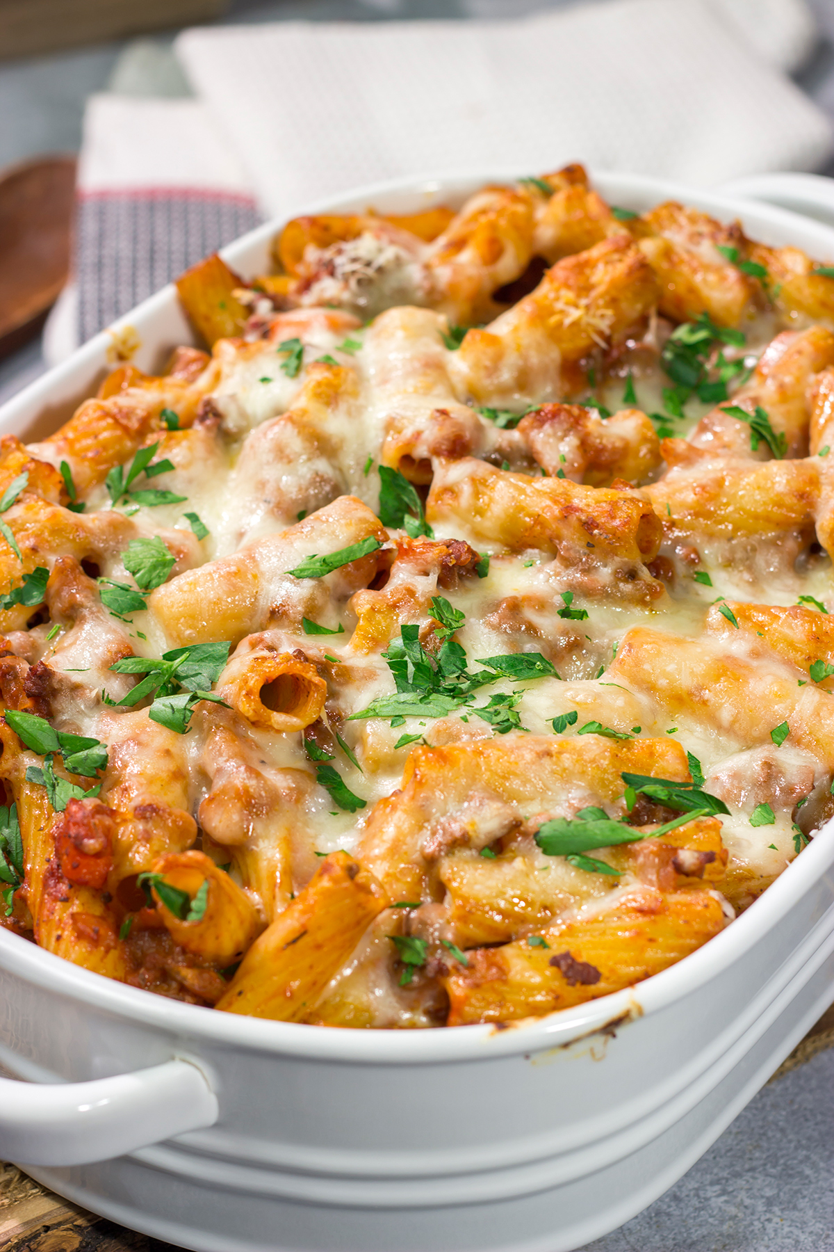 This Baked Pasta Bolognese is the ultimate comfort food! The homemade Bolognese sauce is layered with pasta and cheese to create a delicious recipe that's sure to become a family favorite!