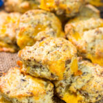 Instead of putting sausage and cheese on a biscuit, put sausage and cheese IN a biscuit! These Cheesy Sausage Biscuits are the perfect savory breakfast for a cold morning.