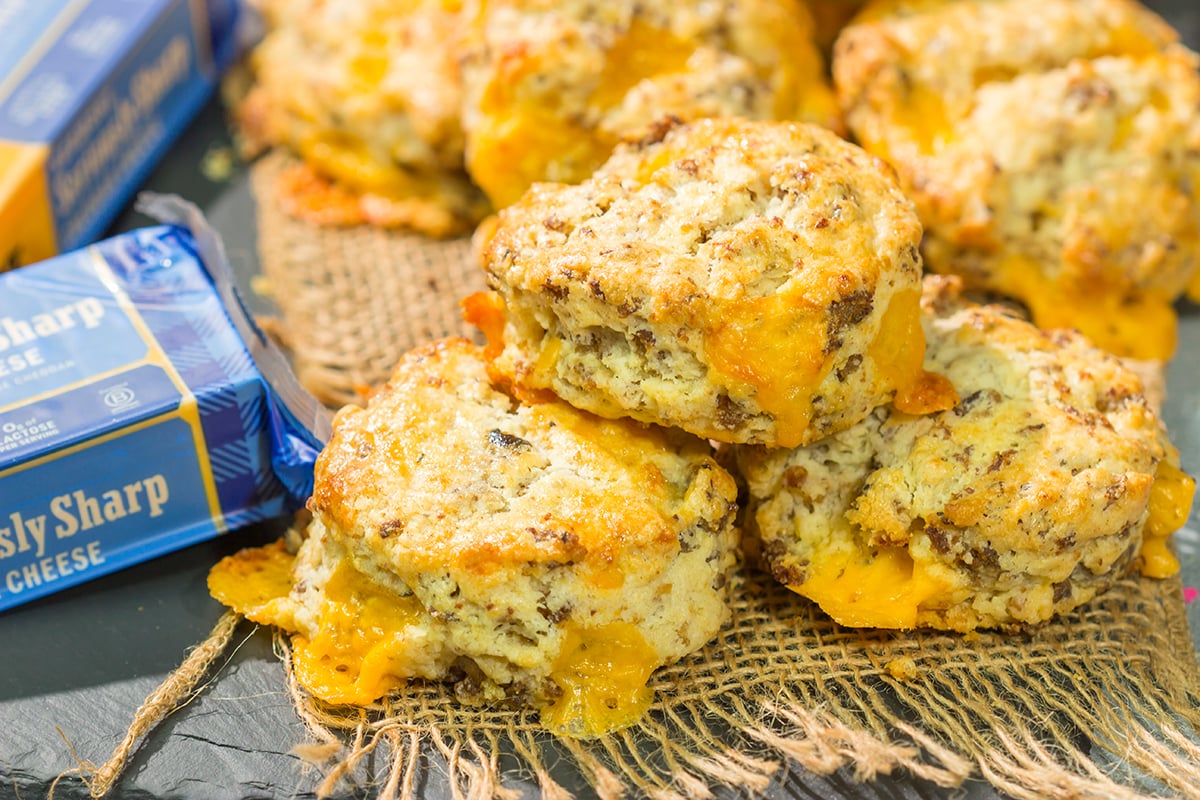 Instead of putting sausage and cheese on a biscuit, put sausage and cheese IN a biscuit! These Cheesy Sausage Biscuits are the perfect savory breakfast for a cold morning.