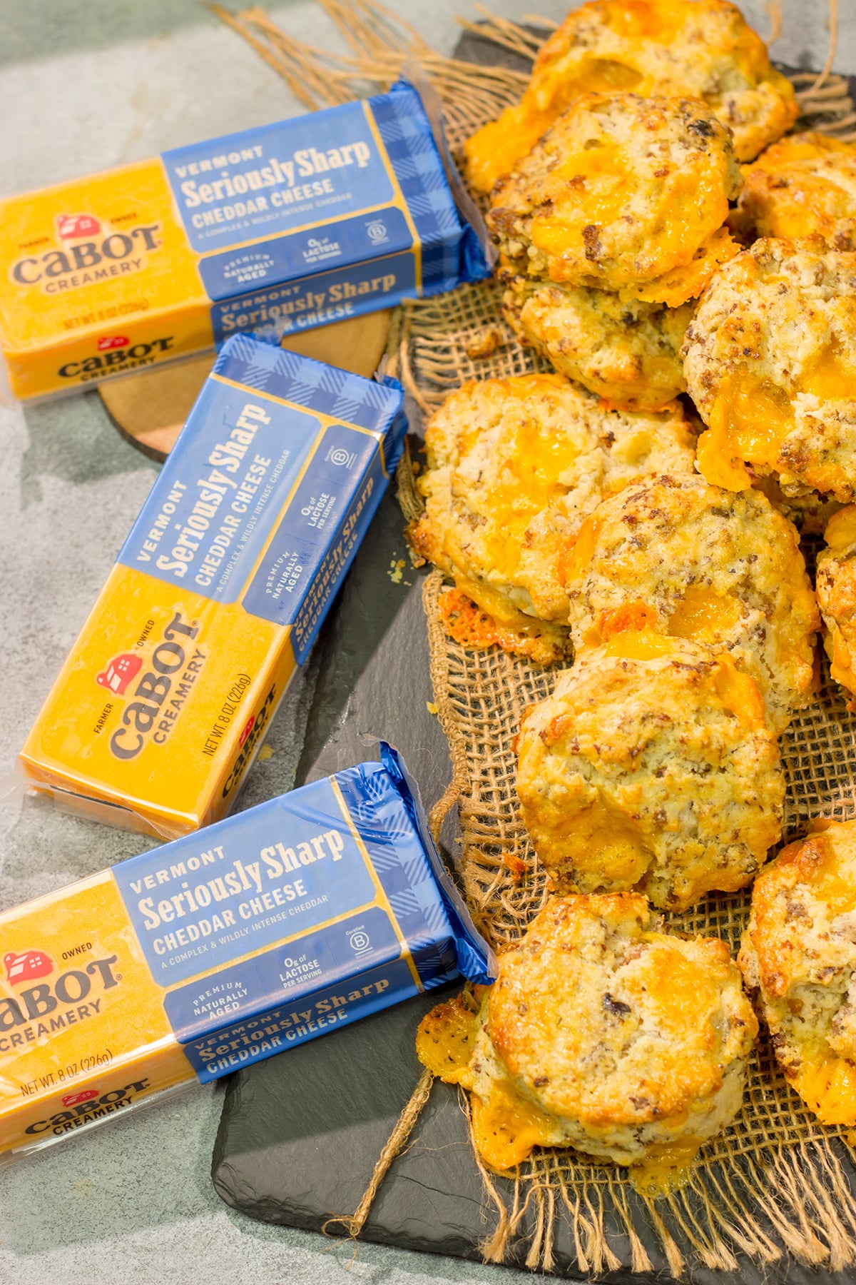 Instead of putting sausage and cheese on a biscuit, put sausage and cheese IN a biscuit! These Cheesy Sausage Biscuits are the perfect savory breakfast for a cold morning.