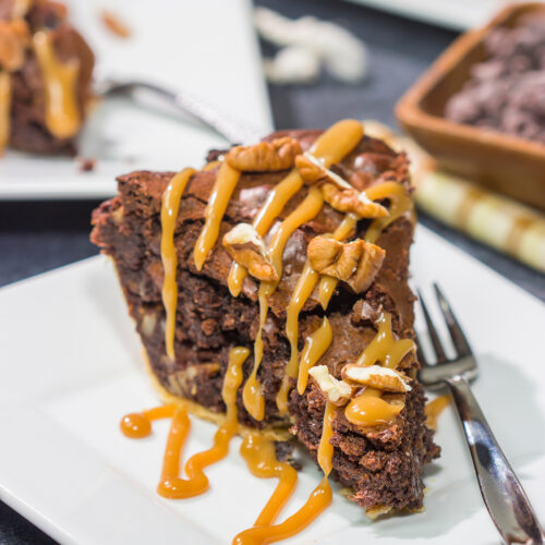 Is it a brownie? Is it a pie? It's both! This Caramel Pecan Brownie Pie is a fun mash-up of two favorite desserts. Enjoy!