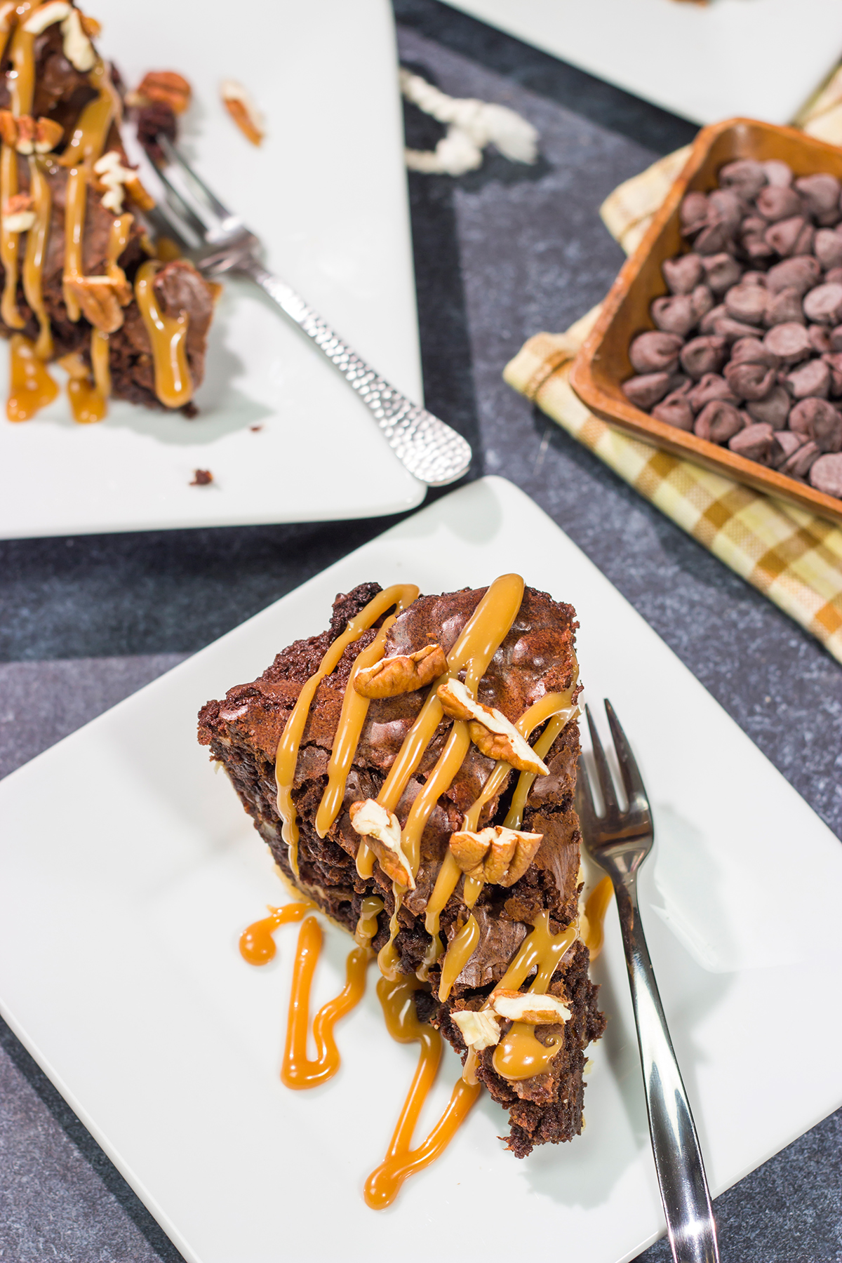 Is it a brownie? Is it a pie? It's both! This Caramel Pecan Brownie Pie is a fun mash-up of two favorite desserts. Enjoy!