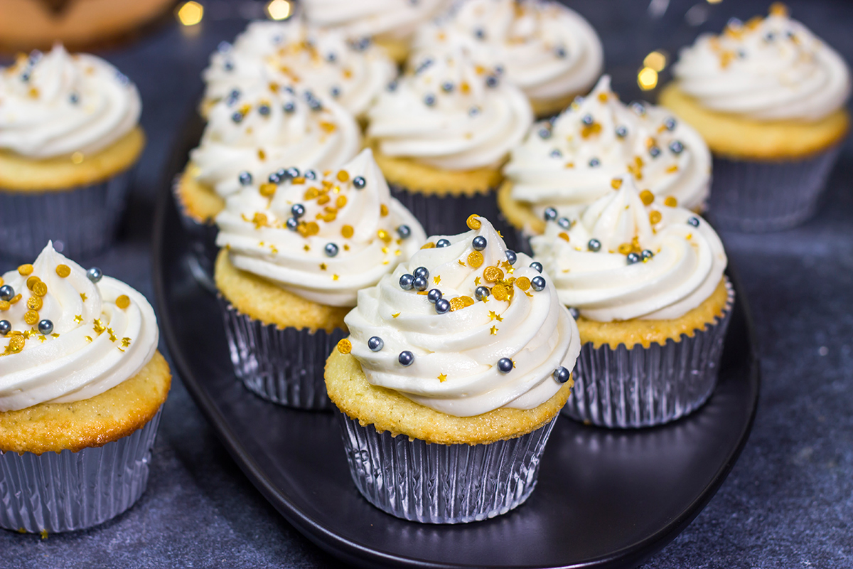These Champagne Cupcakes feature tender vanilla cupcakes topped with creamy champagne buttercream. They're the perfect treat for New Year's Eve...or any other night of the year!