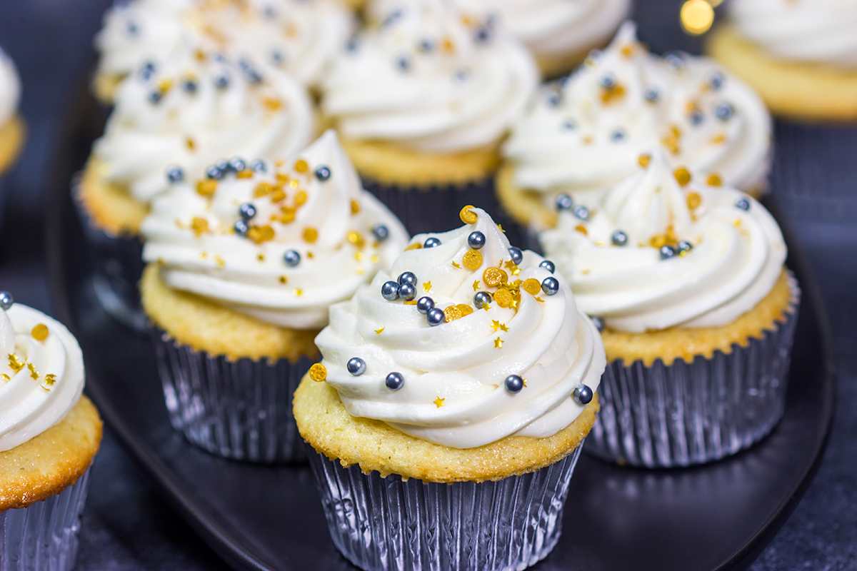 These Champagne Cupcakes feature tender vanilla cupcakes topped with creamy champagne buttercream. They're the perfect treat for New Year's Eve...or any other night of the year!