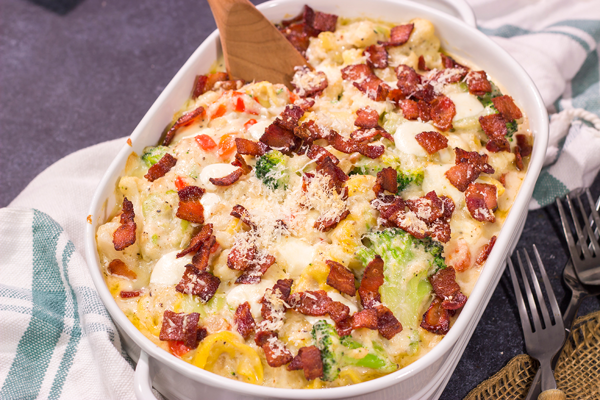 Featuring tender tortellini pasta mixed with a creamy sauce, this Cheesy Tortellini Casserole is the ultimate comfort food recipe!