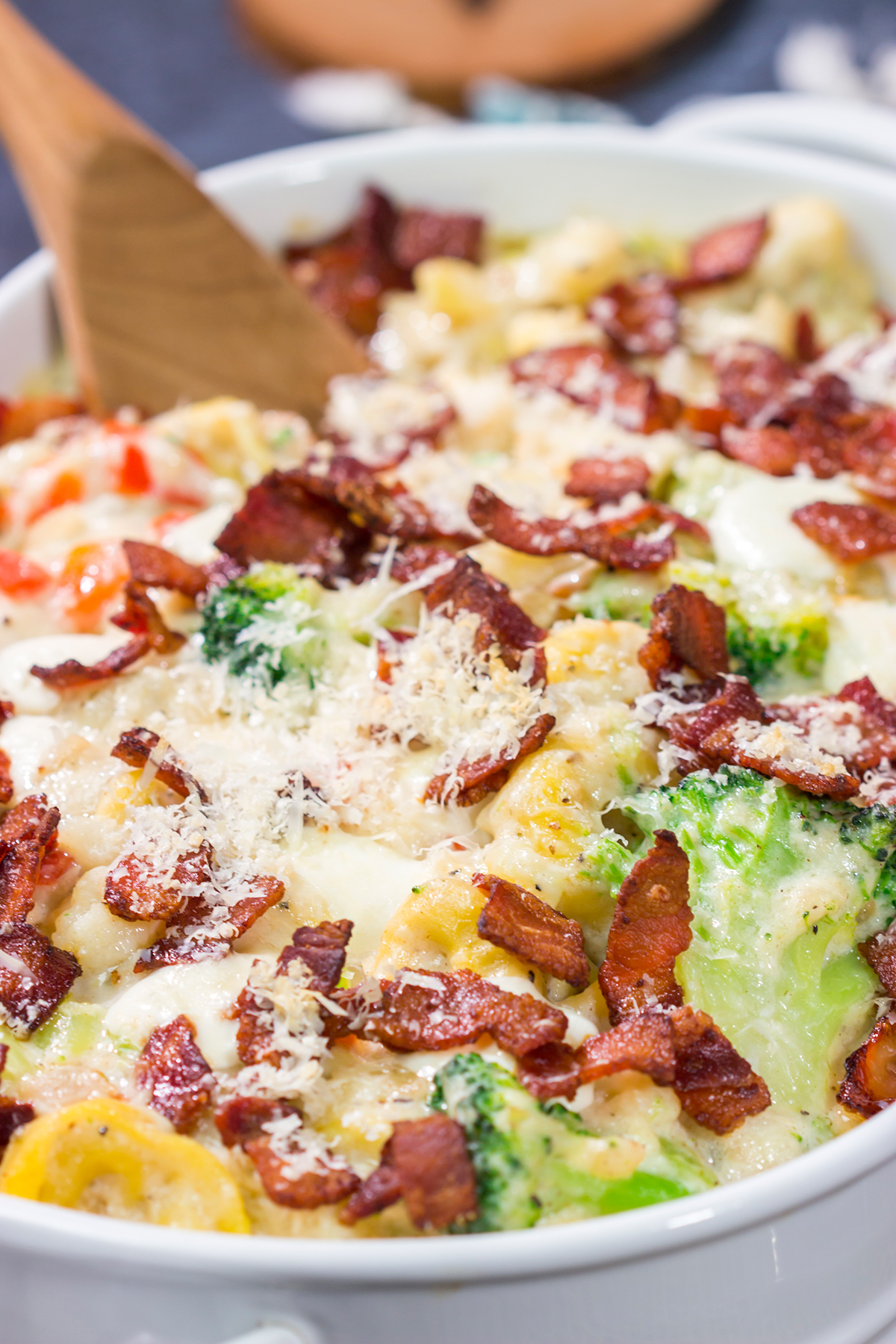 Featuring tender tortellini pasta mixed with a creamy sauce, this Cheesy Tortellini Casserole is the ultimate comfort food recipe!