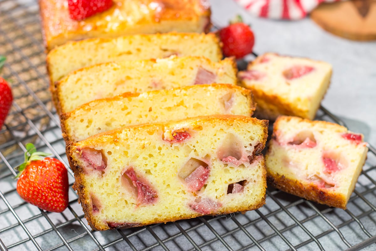 This Fresh Strawberry Bread tastes like summer in a pan! The soft and tender bread is packed with juicy diced strawberries for a perfect breakfast treat or mid-morning snack.