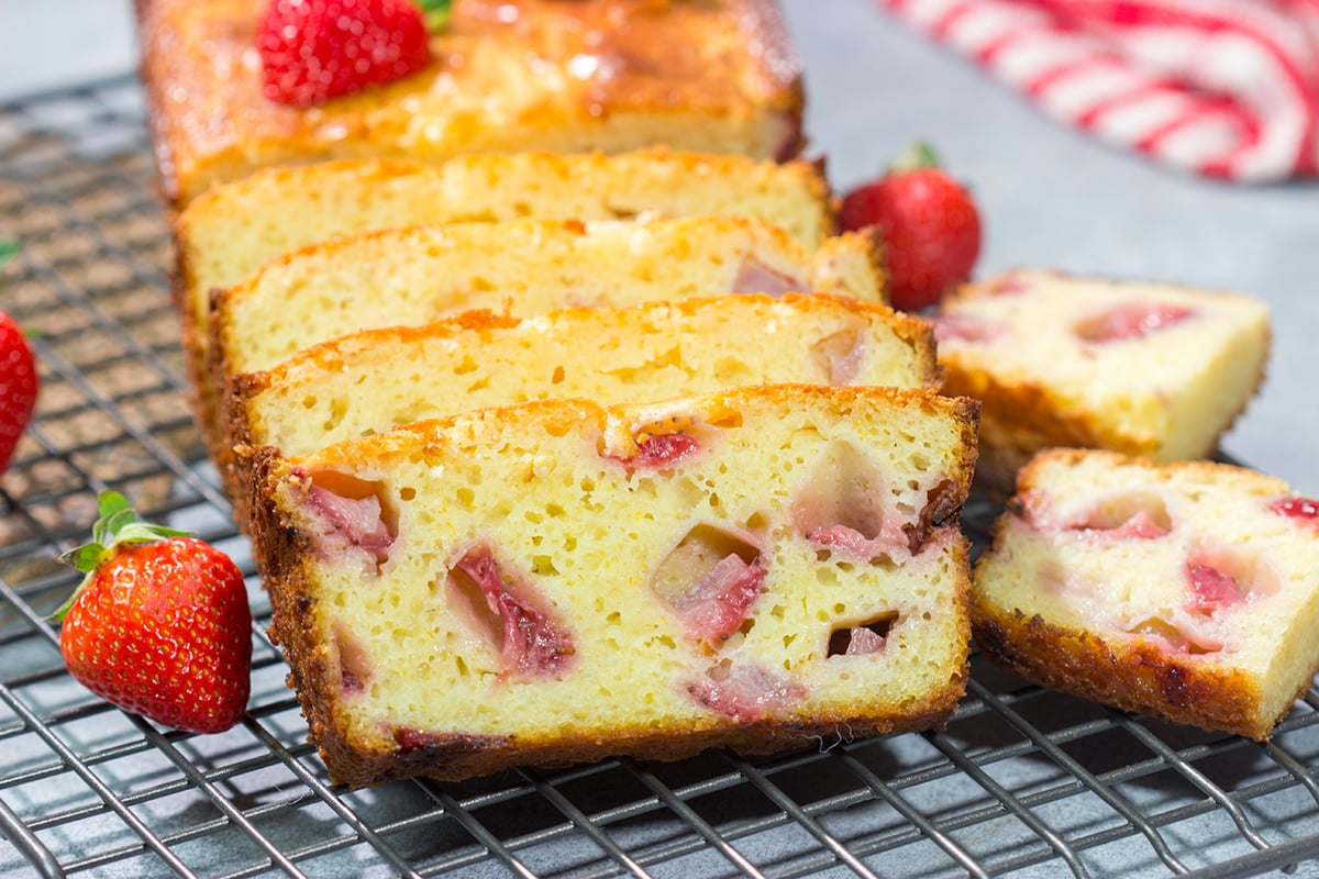 This Fresh Strawberry Bread tastes like summer in a pan! The soft and tender bread is packed with juicy diced strawberries for a perfect breakfast treat or mid-morning snack.