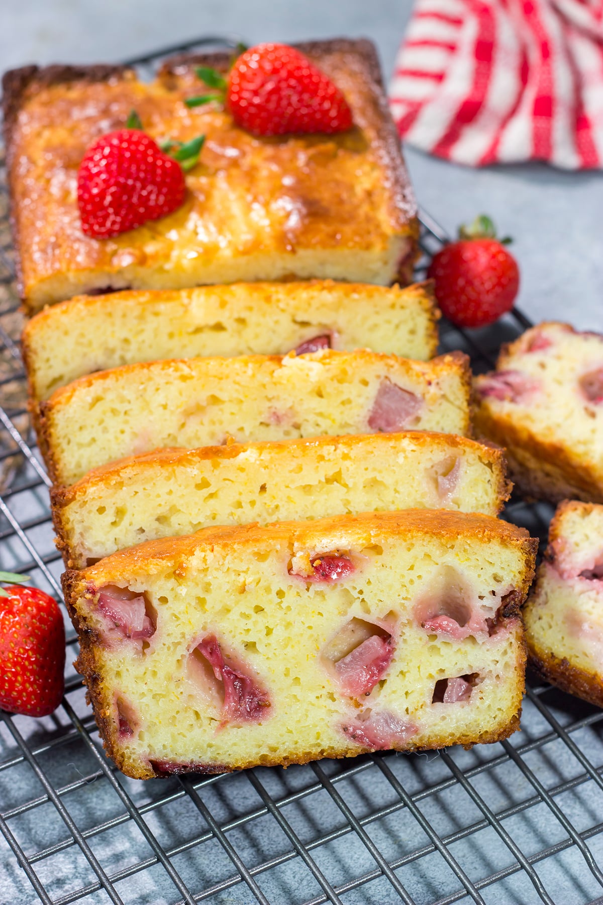 This Fresh Strawberry Bread tastes like summer in a pan! The soft and tender bread is packed with juicy diced strawberries for a perfect breakfast treat or mid-morning snack.