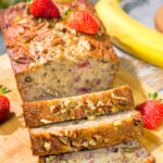 This Strawberry Banana Bread is packed with ripe banana + fresh strawberry flavor. A slice of this bread with a mug of hot coffee is a pretty fantastic way to start the day!