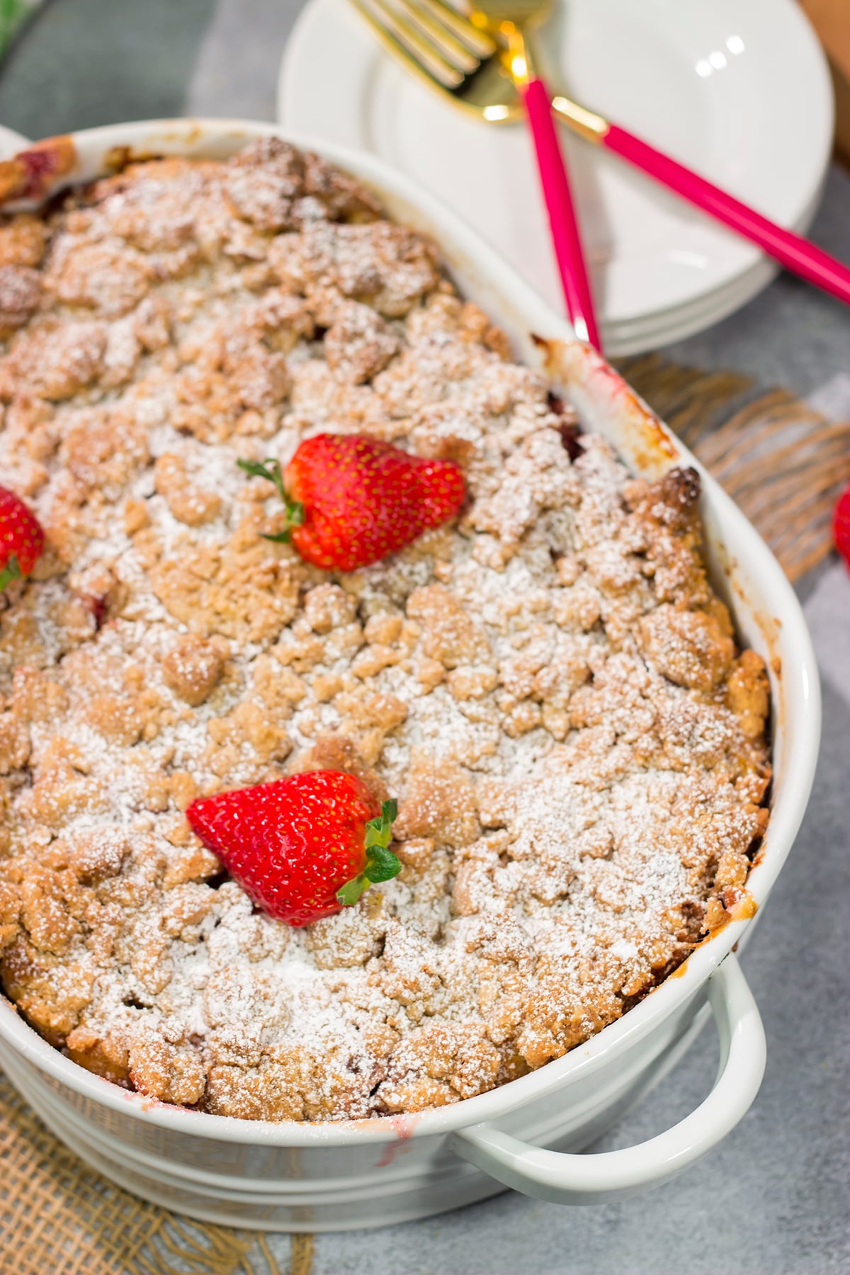 Fresh juicy strawberries combine with a rich custard filling in this Strawberry French Toast Bake. This make-ahead casserole is perfect for weekend breakfast!