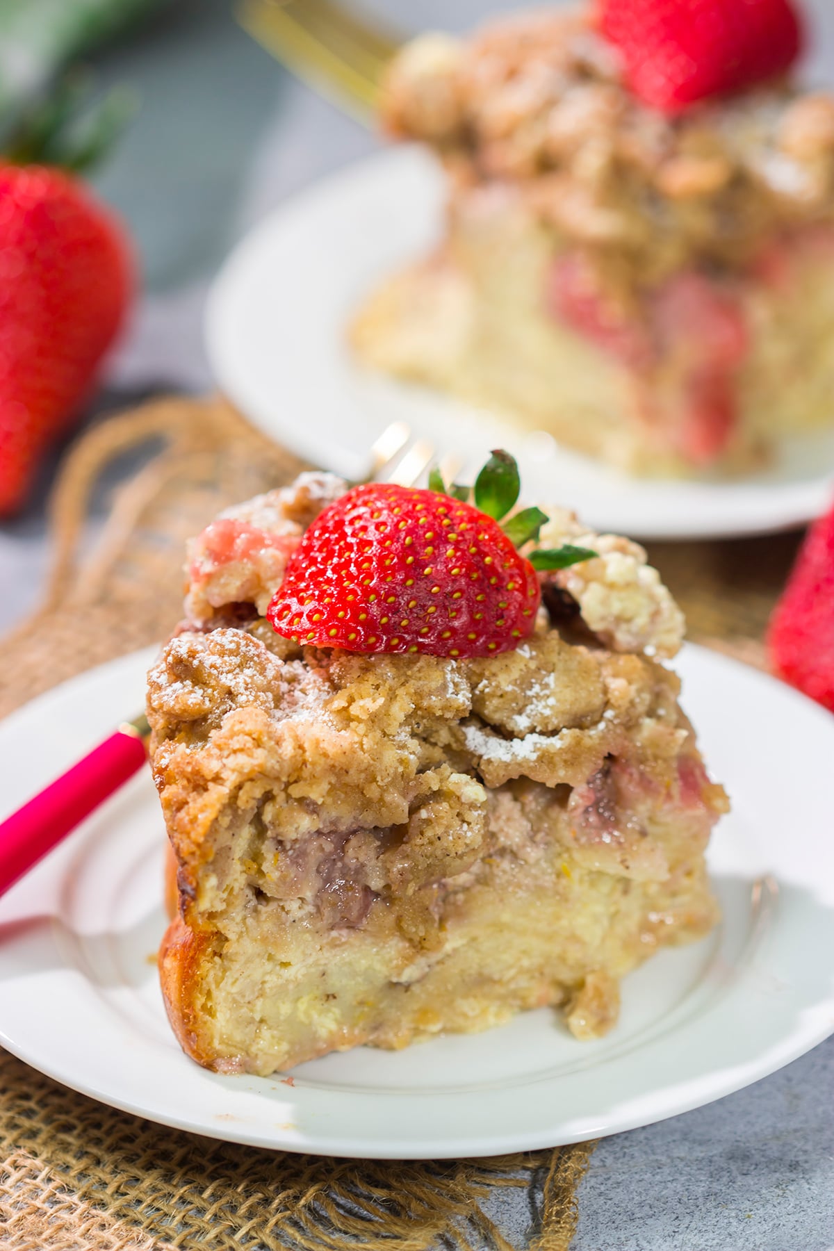 Fresh juicy strawberries combine with a rich custard filling in this Strawberry French Toast Bake. This make-ahead casserole is perfect for weekend breakfast!