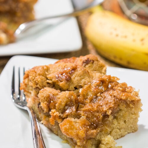 Featuring the flavors of the classic New Orleans dessert, this Bananas Foster Cake is truly fantastic! The tender cake is topped with a brown sugar streusel and rum sauce. Grab a fork!