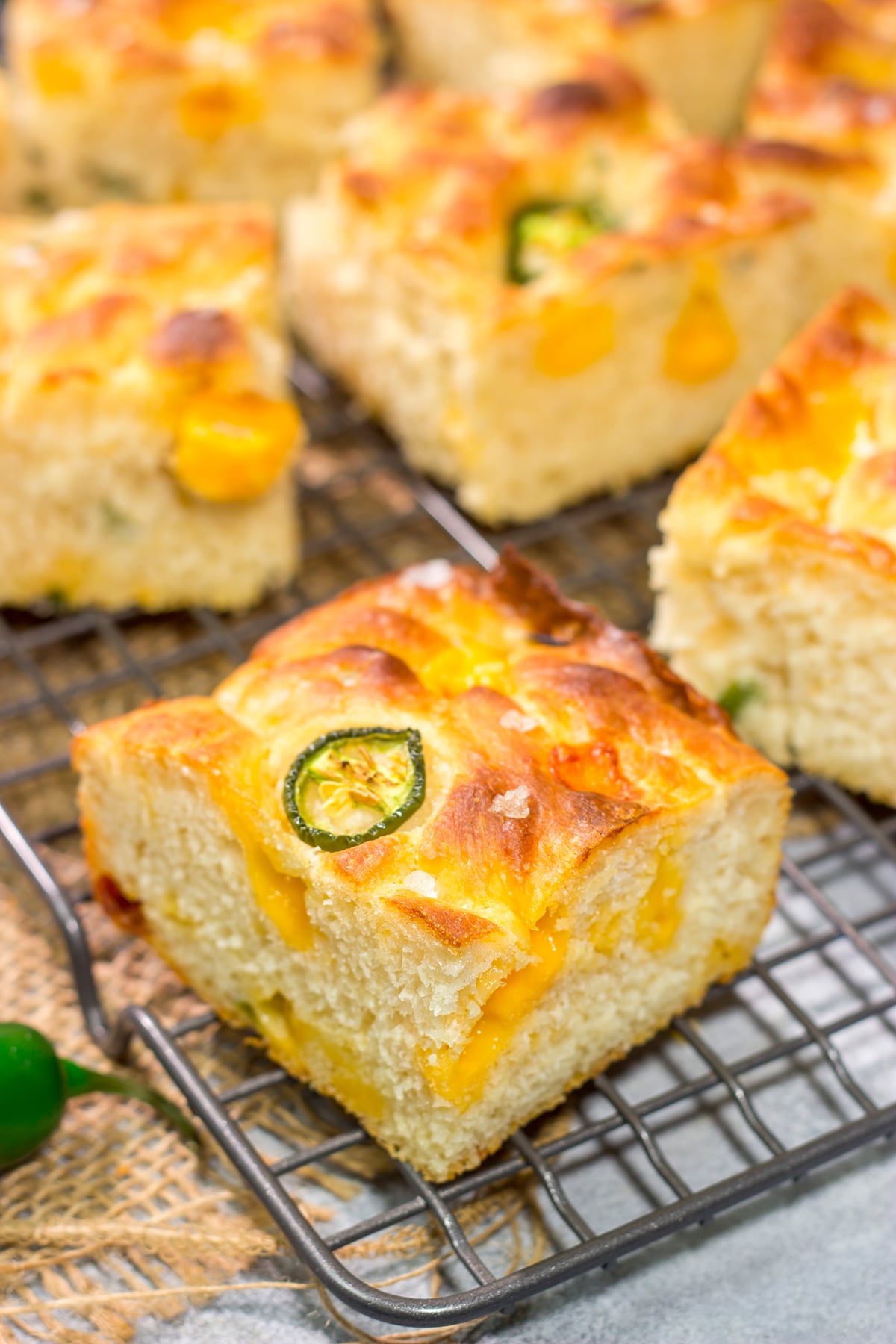 This Jalapeno Cheddar Focaccia features diced jalapenos and chunks of sharp cheddar cheese. It's fantastic next to soups and stews, or it can be sliced into sandwich bread. Grilled cheese sandwich, anyone??
