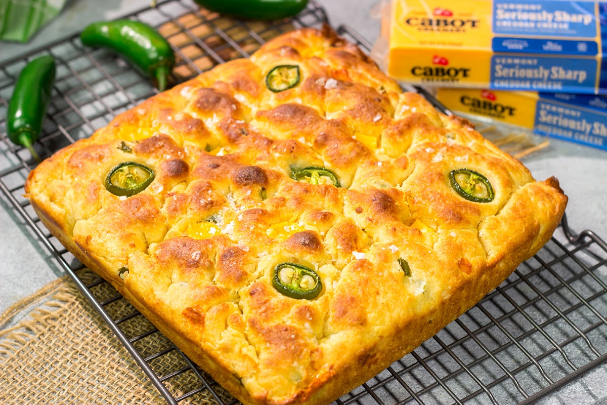 This Jalapeno Cheddar Focaccia features diced jalapenos and chunks of sharp cheddar cheese. It's fantastic next to soups and stews, or it can be sliced into sandwich bread. Grilled cheese sandwich, anyone??