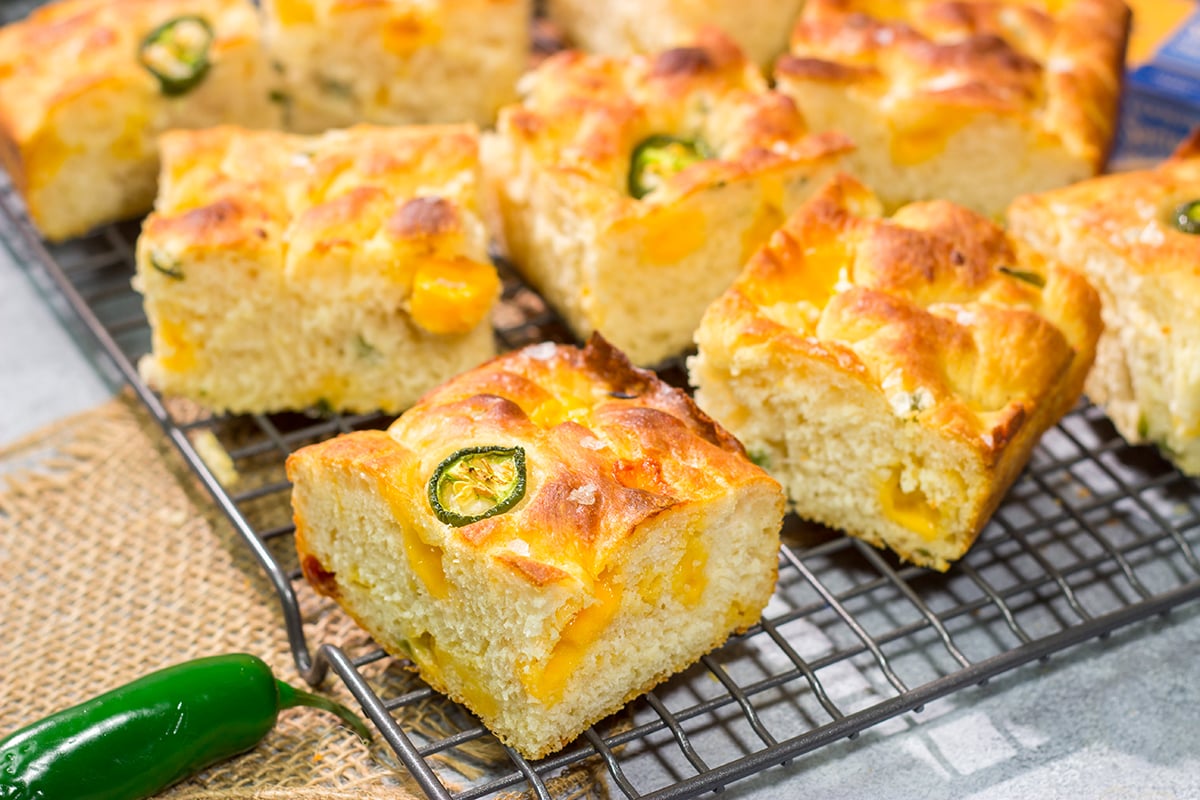 This Jalapeno Cheddar Focaccia features diced jalapenos and chunks of sharp cheddar cheese. It's fantastic next to soups and stews, or it can be sliced into sandwich bread. Grilled cheese sandwich, anyone??