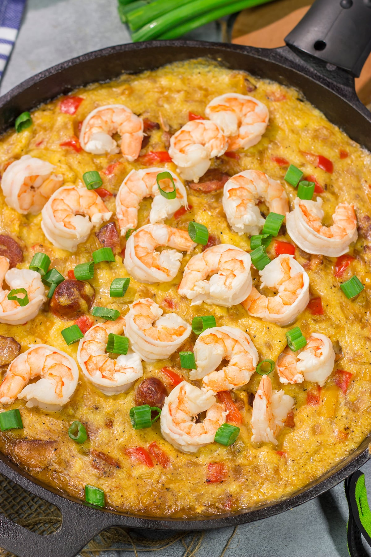 This Shrimp and Grits Casserole recipe is a fun twist on a classic. This flavor-packed casserole is the ultimate Southern comfort food!