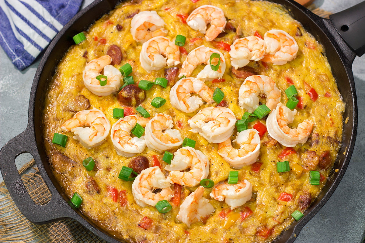 This Shrimp and Grits Casserole recipe is a fun twist on a classic. This flavor-packed casserole is the ultimate Southern comfort food!