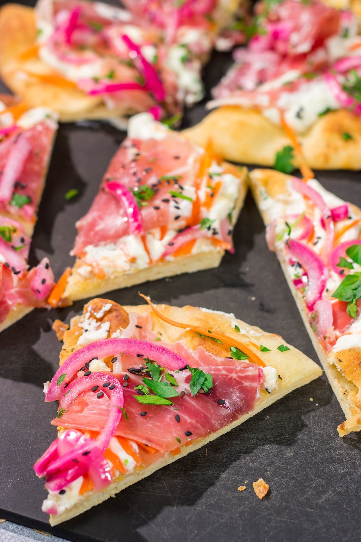 Featuring slightly crispy flatbread topped with creamy ricotta, this Whipped Ricotta Flatbread makes for an excellent summer lunch or appetizer. Cheers!