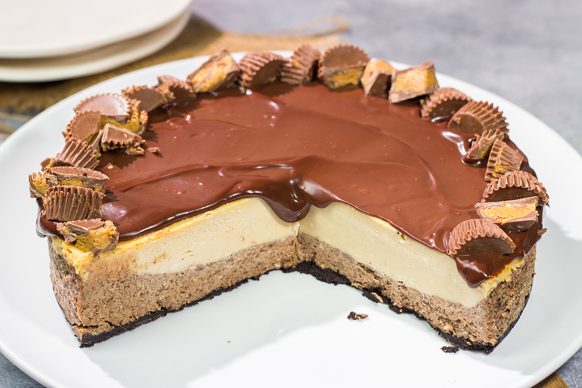 This Chocolate Peanut Butter Cheesecake features creamy layers of cheesecake topped with a decadent chocolate ganache. It's the ultimate chocolate lover's dessert!