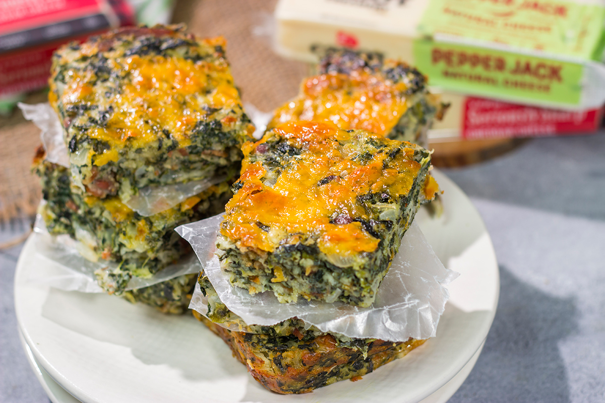 These baked Bacon Cheddar Spinach Squares are packed with flavor! They're easy to make, and they're perfect as a side dish or party appetizer.
