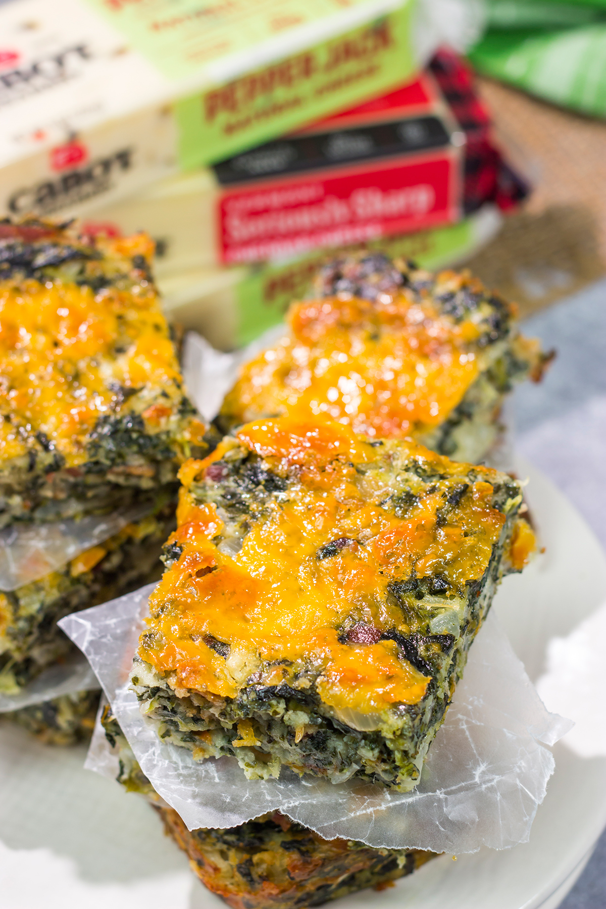 These baked Bacon Cheddar Spinach Squares are packed with flavor! They're easy to make, and they're perfect as a side dish or party appetizer.