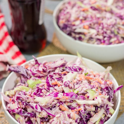 Add a fun twist to a classic coleslaw recipe with this Coca Cola Coleslaw. This classic slaw is flavorful and easy to make. It's perfect for summer picnics and BBQs!