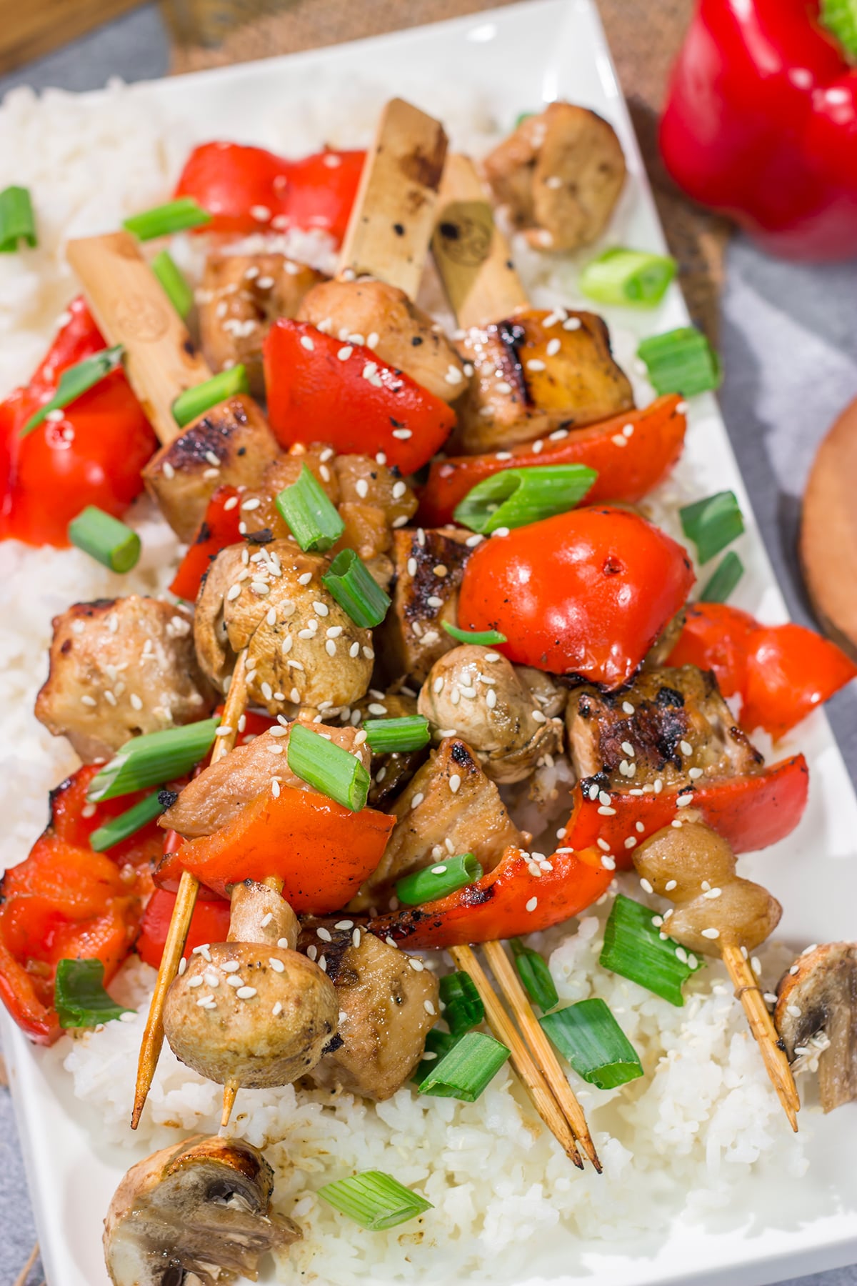 This delicious Grilled Yakitori Chicken recipe features juicy chicken brushed with a sweet and savory grilling sauce. It's the perfect way to mix up the summer grilling routine!