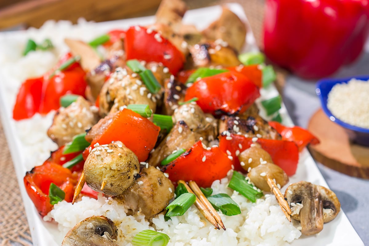 This delicious Grilled Yakitori Chicken recipe features juicy chicken brushed with a sweet and savory grilling sauce. It's the perfect way to mix up the summer grilling routine!