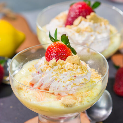 This Lemon Strawberry Pudding dessert features fresh, juicy strawberries layered with a mouthwatering lemon pudding. Oh, and don't forget the strawberry whipped cream on top!
