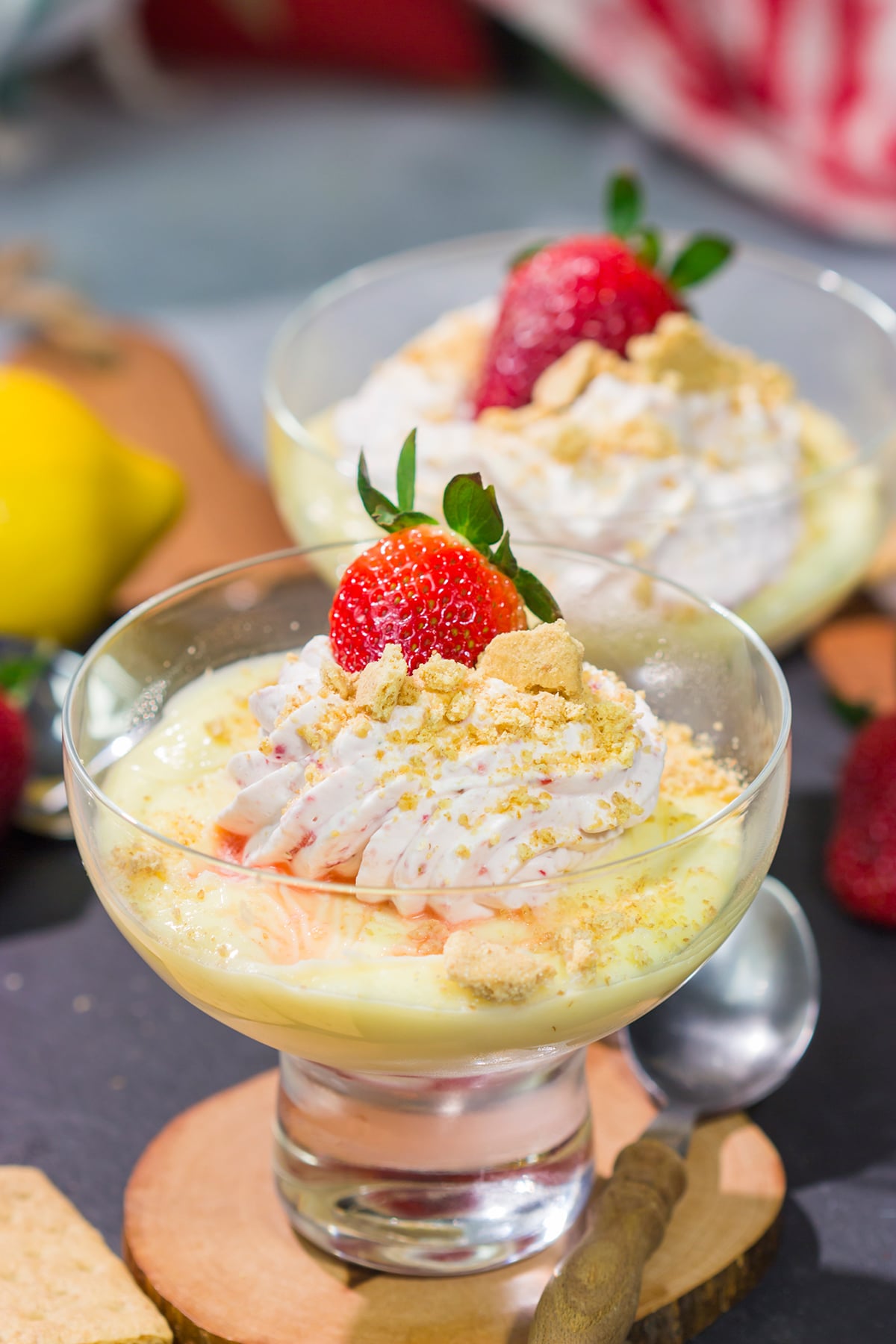 This Lemon Strawberry Pudding dessert features fresh, juicy strawberries layered with a mouthwatering lemon pudding. Oh, and don't forget the strawberry whipped cream on top!