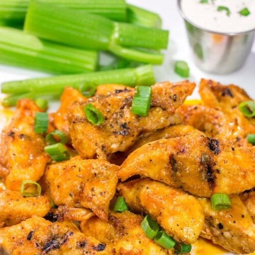 Fire up the grill! Tossed in a homemade buffalo sauce, these Grilled Boneless Buffalo Wings are a fun recipe for summer!
