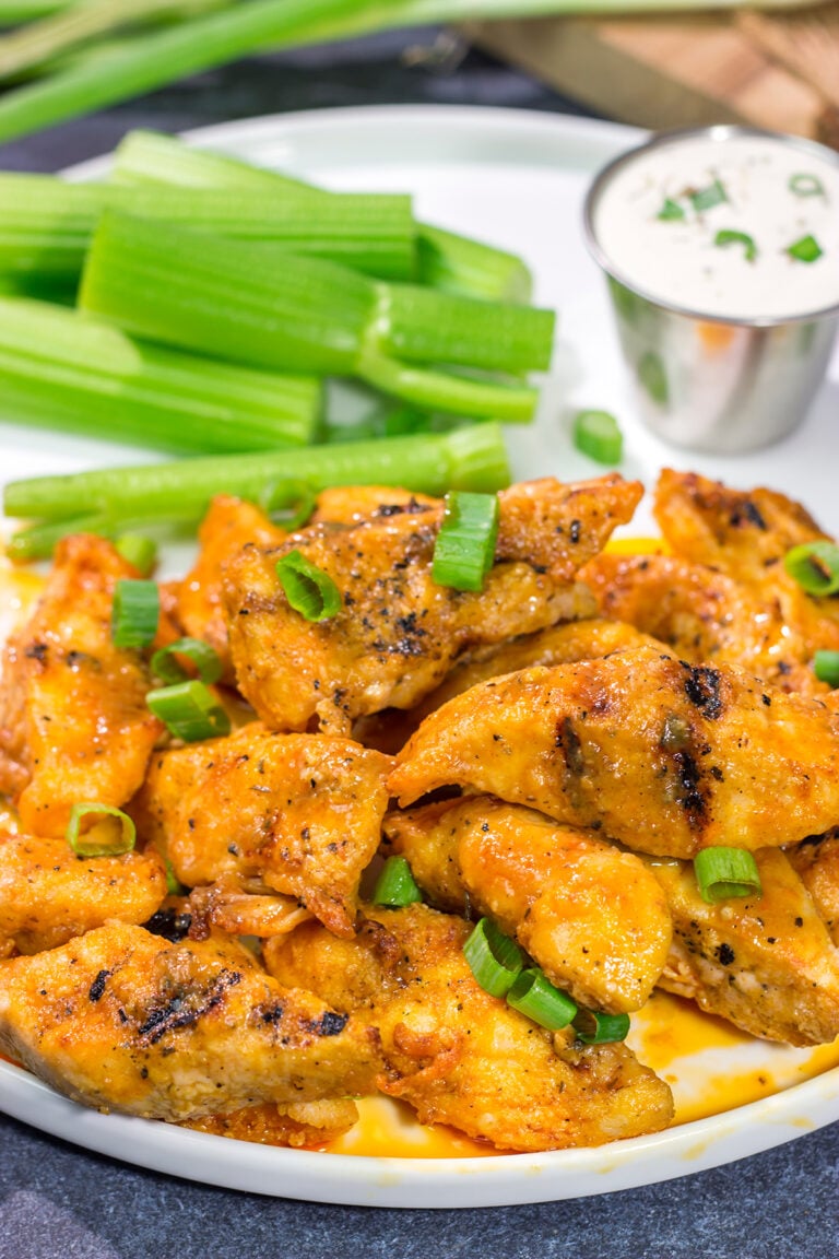 Fire up the grill! Tossed in a homemade buffalo sauce, these Grilled Boneless Buffalo Wings are a fun recipe for summer!