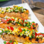 This Grilled Salmon with Corn Salsa is easy enough to make on a weeknight, but impressive enough to serve to company on a weekend. Fire up the grill for dinner tonight!