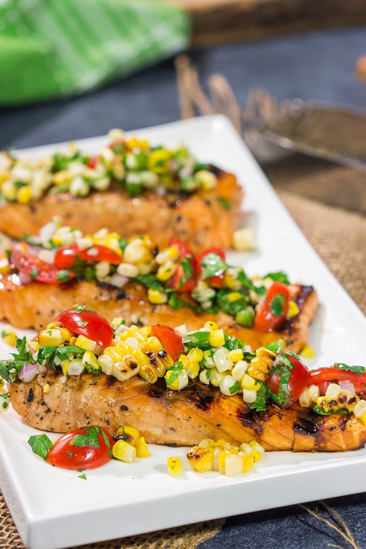 This Grilled Salmon with Corn Salsa is easy enough to make on a weeknight, but impressive enough to serve to company on a weekend. Fire up the grill for dinner tonight!