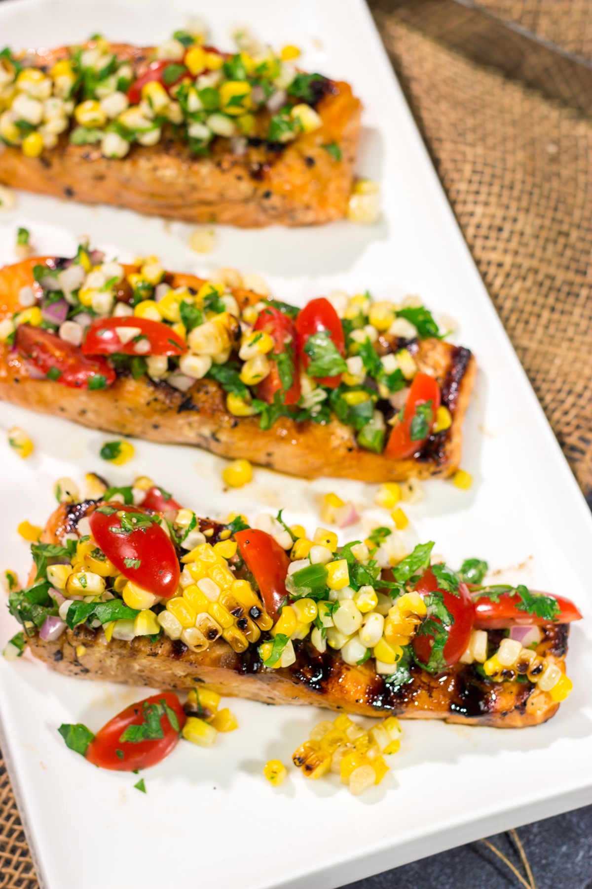 This Grilled Salmon with Corn Salsa is easy enough to make on a weeknight, but impressive enough to serve to company on a weekend. Fire up the grill for dinner tonight!