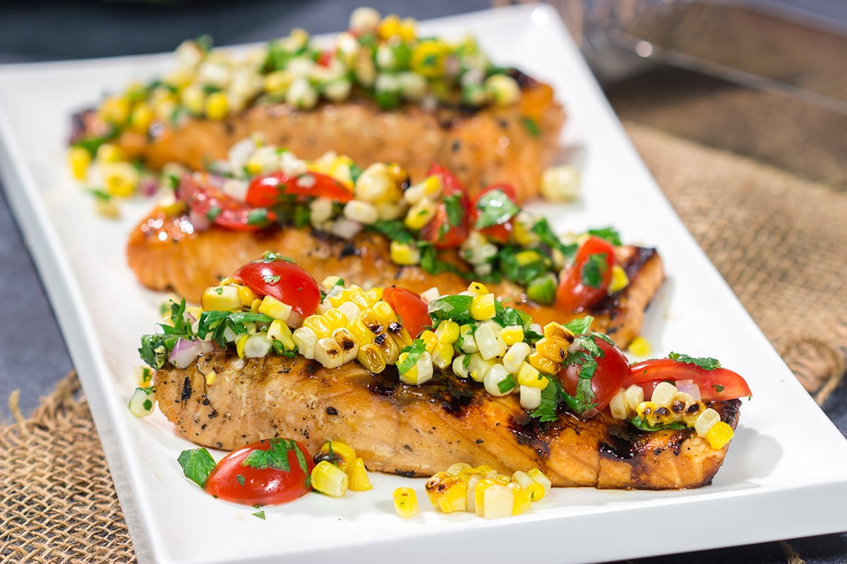 This Grilled Salmon with Corn Salsa is easy enough to make on a weeknight, but impressive enough to serve to company on a weekend. Fire up the grill for dinner tonight!