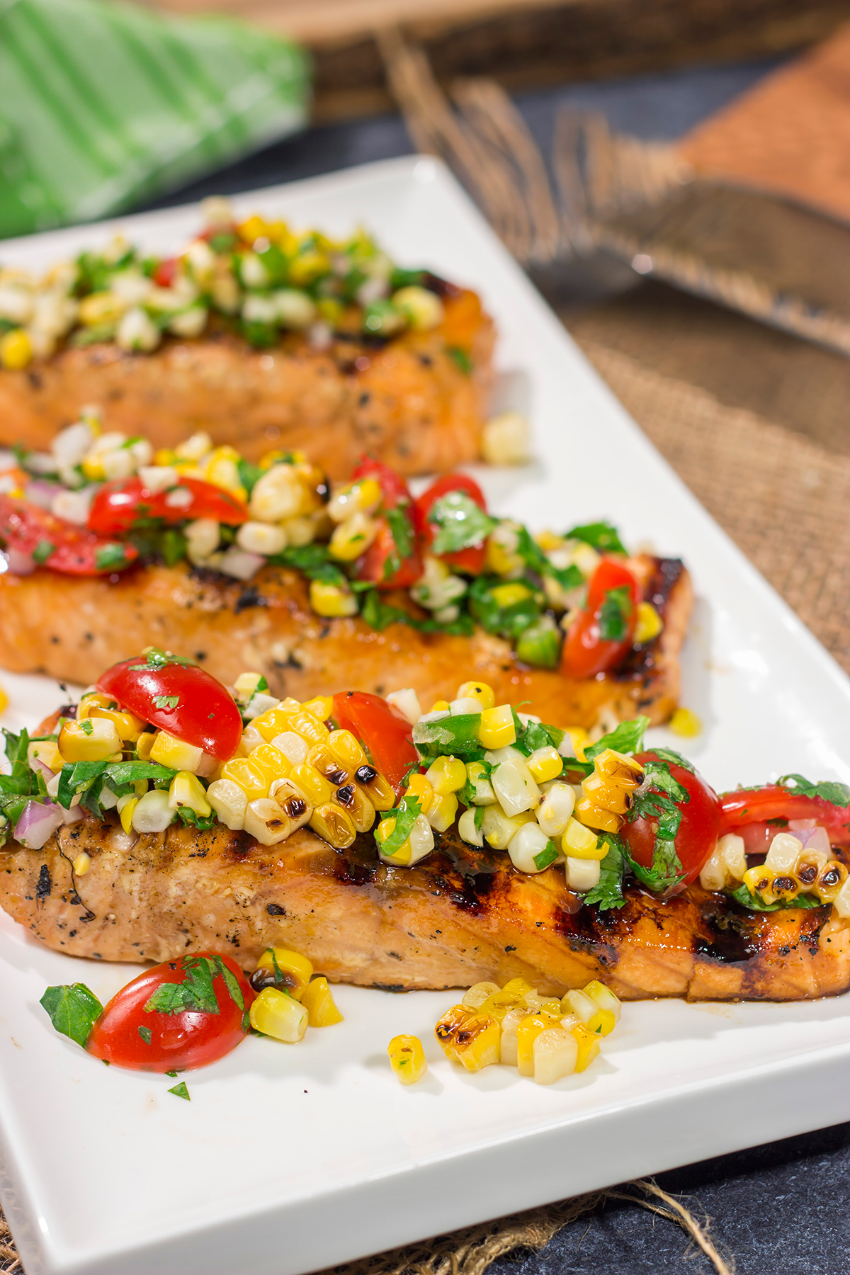 This Grilled Salmon with Corn Salsa is easy enough to make on a weeknight, but impressive enough to serve to company on a weekend. Fire up the grill for dinner tonight!