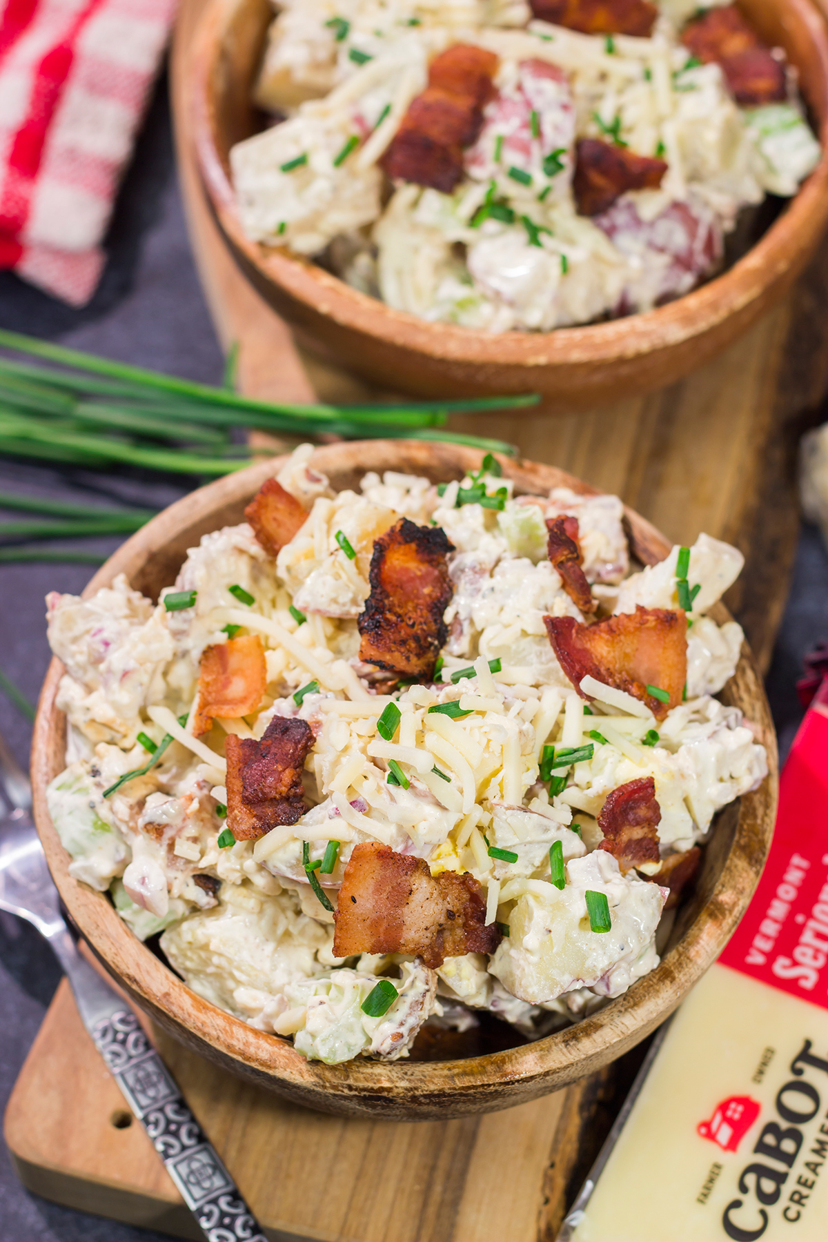 All of the toppings you love on a classic baked potato get combined in this Loaded Baked Potato Salad recipe. It's the perfect side dish for summer!
