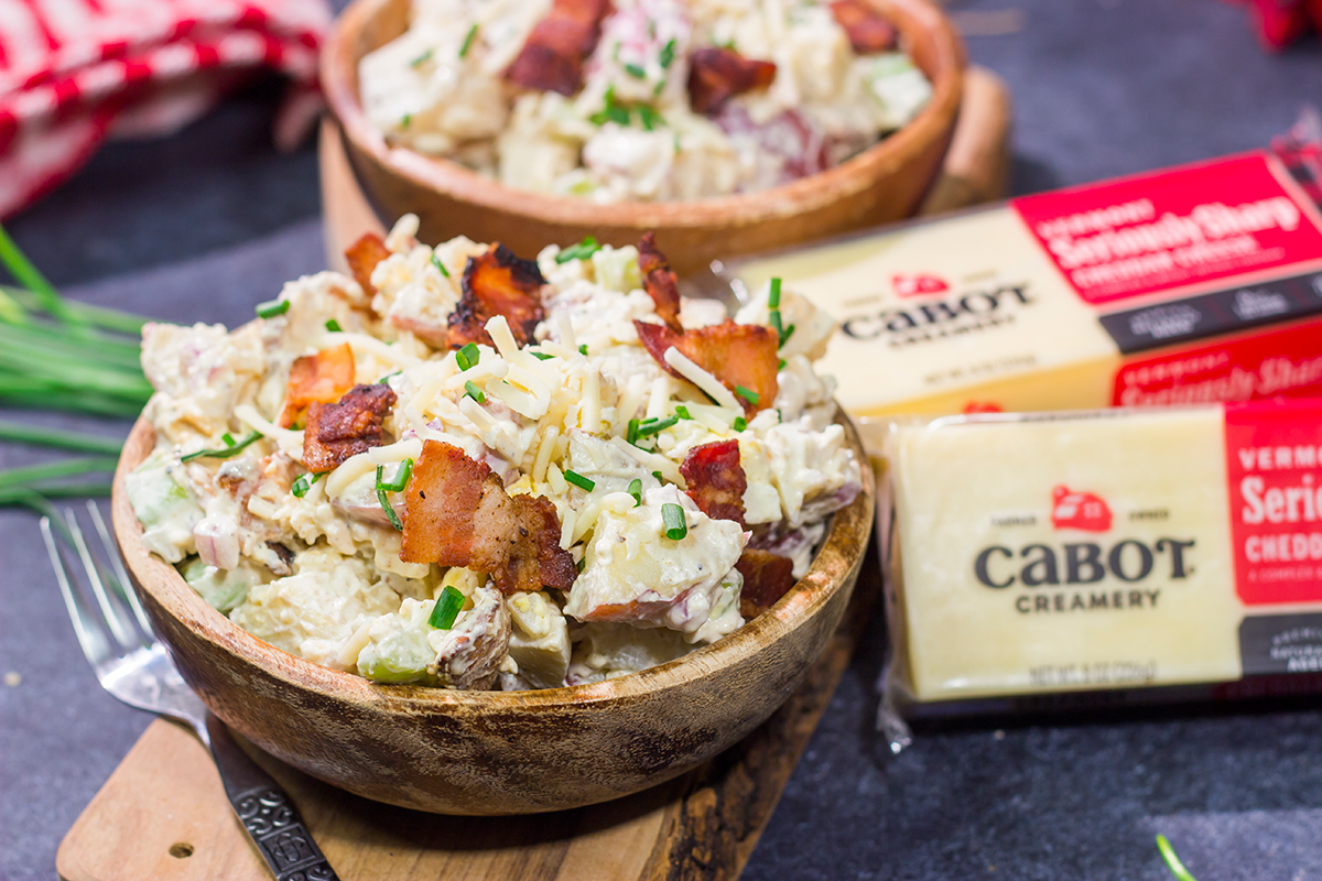 All of the toppings you love on a classic baked potato get combined in this Loaded Baked Potato Salad recipe. It's the perfect side dish for summer!